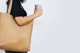 environmentalist-woman-using-eco-friendly-tote-bag-photo-with-design-space